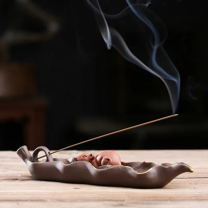 Purple clay ceramic lying incense burner with golden rat design