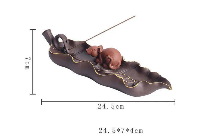 Purple clay ceramic lying incense burner with golden rat design