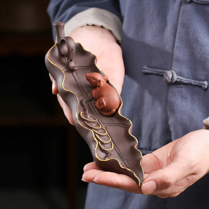 Purple clay ceramic lying incense burner with golden rat design
