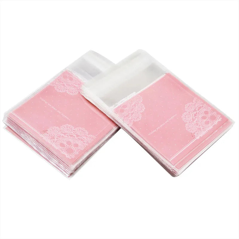 Pink self-adhesive plastic packaging bags with a 3cm flap, shown sealed and open, for handmade soap.