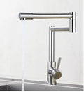 Silver stainless steel kitchen mixing tap with rotating spout and dual hot cold controls