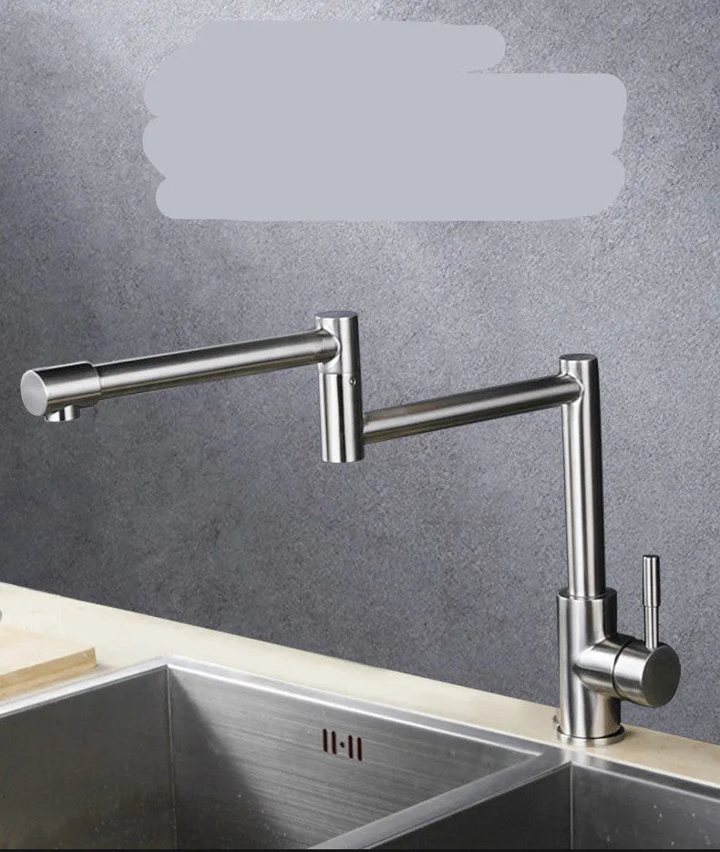 Silver stainless steel kitchen mixing tap with rotating spout and dual hot cold controls