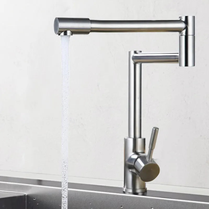 Silver stainless steel kitchen mixing tap with rotating spout and dual hot cold controls