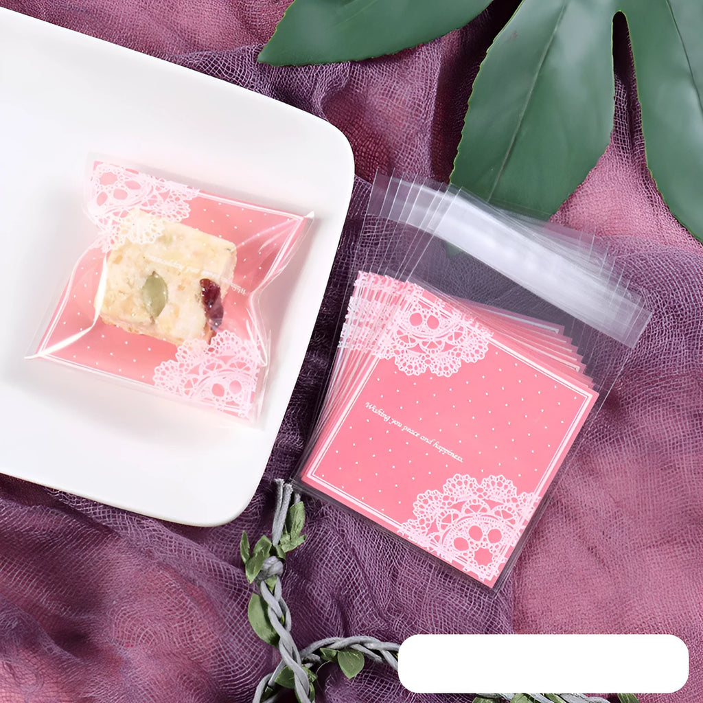Pink self-adhesive plastic packaging bags with a 3cm flap, shown sealed and open, for handmade soap.