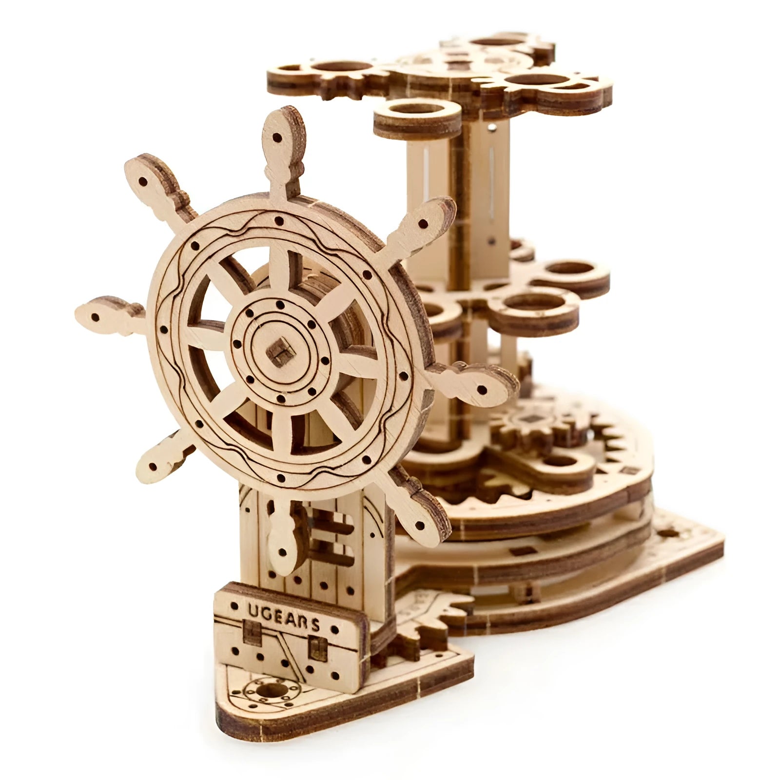 Ukrainian wooden rotating pen holder with steering wheel mechanism on a desk, holding coloured pencils