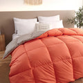 Goose down winter duvet in pink colour on a bed, showing twill weave fabric texture.
