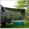 Green double tent car side awning with aluminium pole setup outdoors