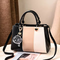 European American fashion shoulder handbag in PU with soft handle and multiple inner pockets.