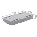 Grey plastic under-table drawer storage box for stationery, shown mounted underneath a wooden desk.