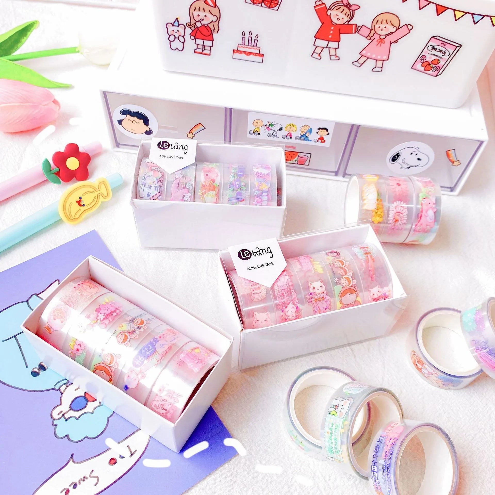 Five rolls of cartoon washi tape with dinosaur, duck, lucky cat, and rabbit designs.