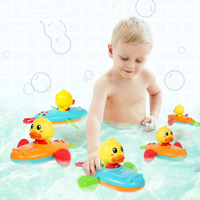 Yellow plastic wind-up swimming bath toy for children's water play activities