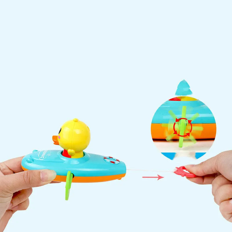 Yellow plastic wind-up swimming bath toy for children's water play activities