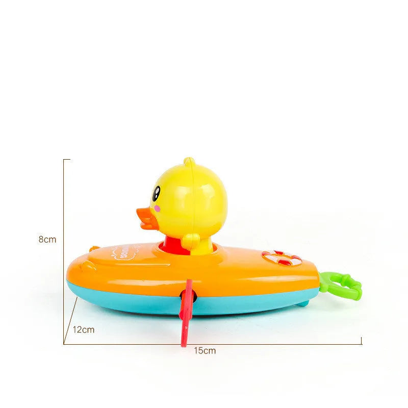 Yellow plastic wind-up swimming bath toy for children's water play activities