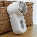 White portable electric lint remover trimmer with ABS construction for clothing fabric shaving