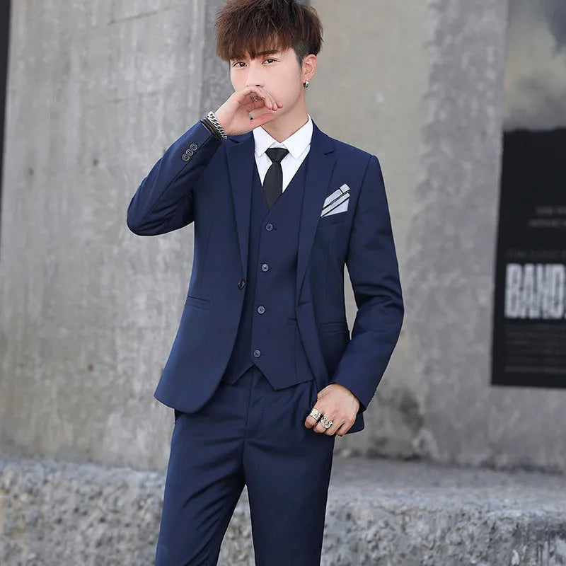 Men's three-piece Korean style slim fit suit in black with lapel collar and single button