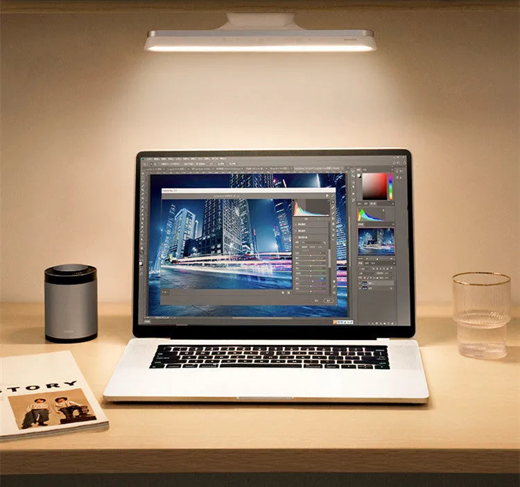 Baseus magnetic LED desk lamp hanging on a wardrobe rail, white, with touch switch and USB port