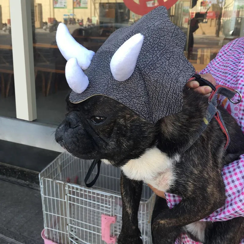 Grey cloth pet triceratops dinosaur hat for dogs and cats, one size.