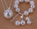 White silver-plated bracelet with three-dimensional geometric ball pendant on white background
