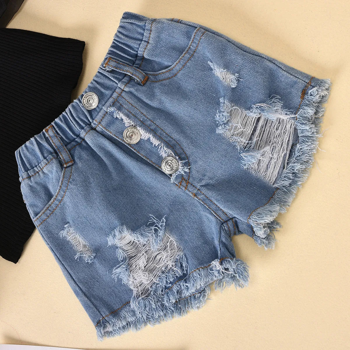 Children's black cotton striped top with dot mesh sleeves and ripped denim shorts suit for kids