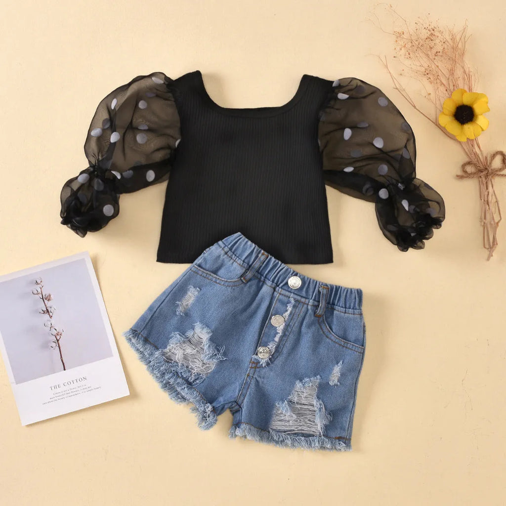 Children's black cotton striped top with dot mesh sleeves and ripped denim shorts suit for kids