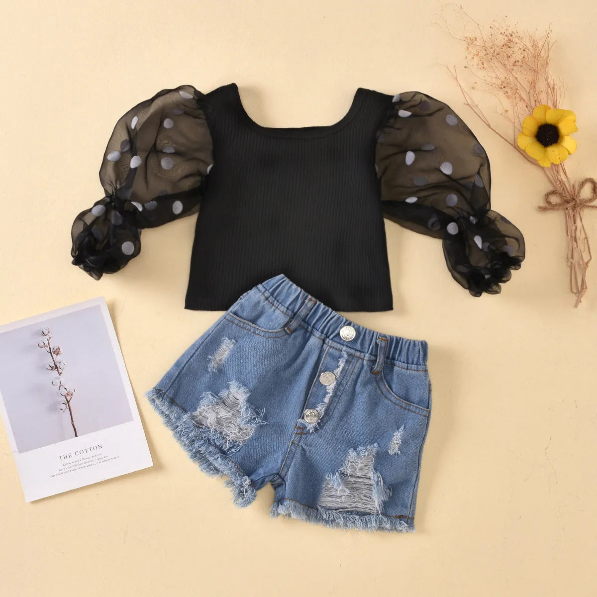Children's black cotton striped top with dot mesh sleeves and ripped denim shorts suit for kids