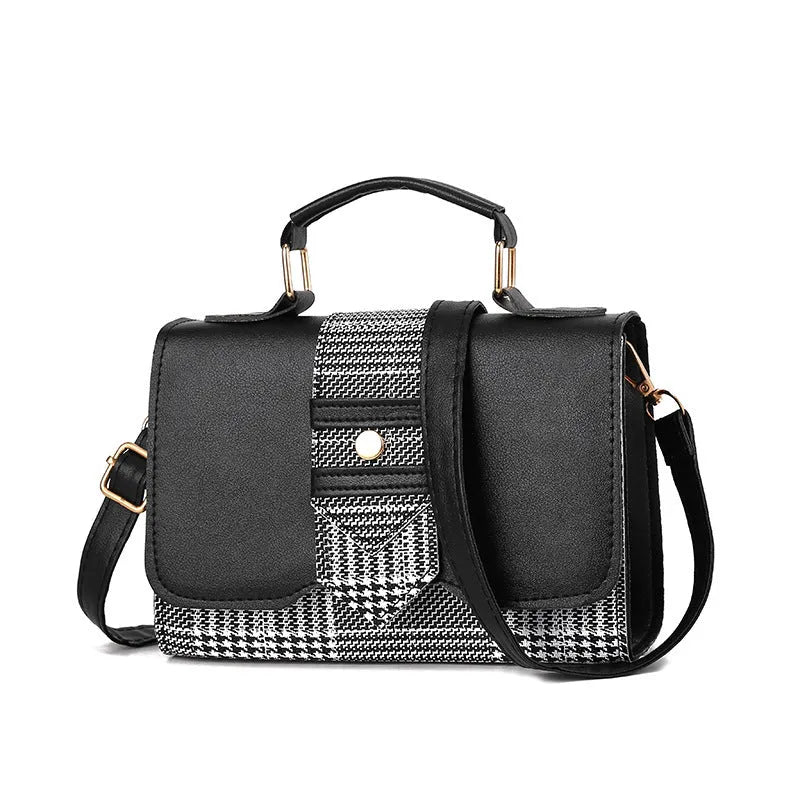 Fashion woman handbag in soft PU with shoulder strap, side view showing polyester lining