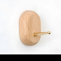 Beech wood wall hook with brass mechanism in five shapes: round, capsule, oval, diamond, and square