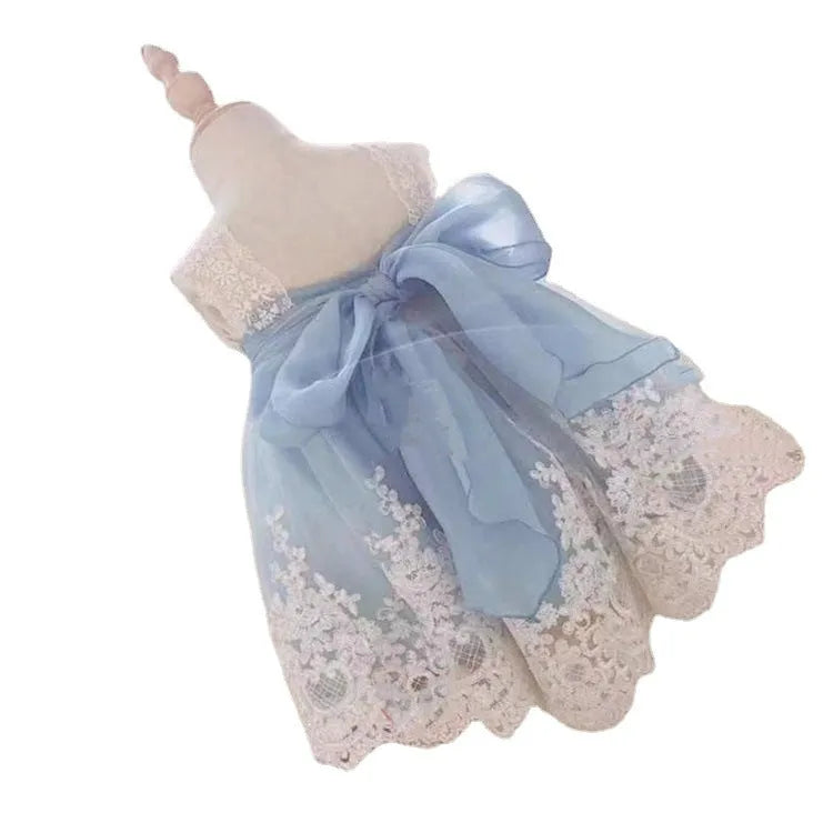 Ocean blue baby girl princess dress with lace detailing, shown on a size chart.
