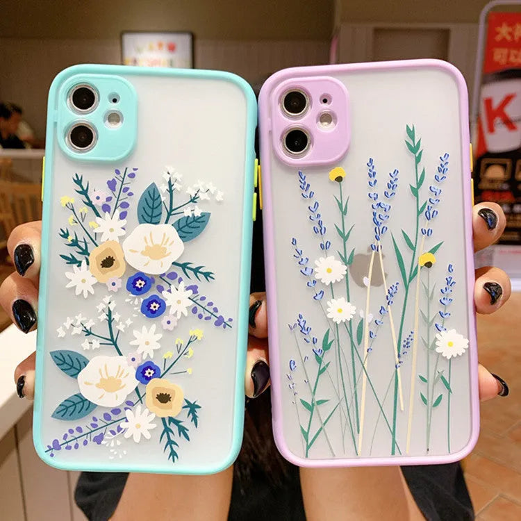 Pink Lavender matte frame iPhone case with painted blue cartoon flowers on a TPU back cover.