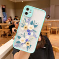 Pink Lavender matte frame iPhone case with painted blue cartoon flowers on a TPU back cover.