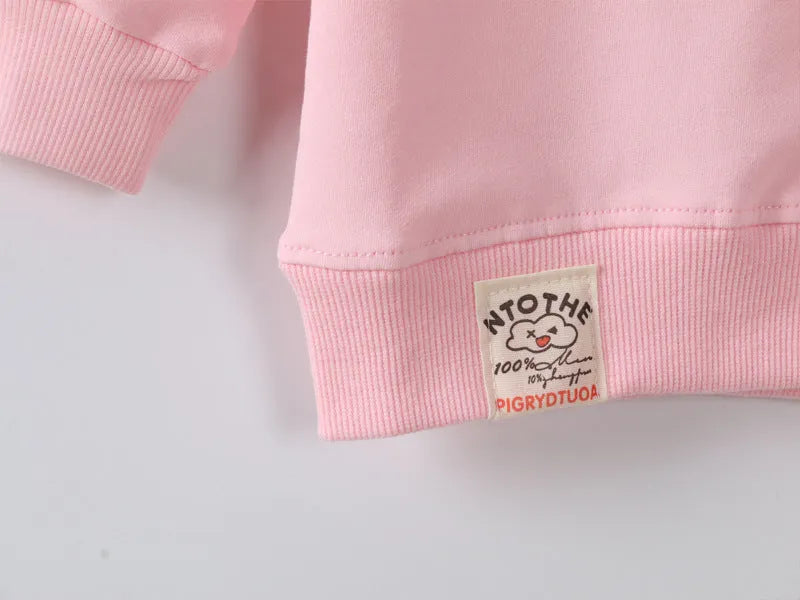 Korean-style cartoon pattern baby girl's sweatshirt for autumn in soft fabric, shown in multiple colour options.