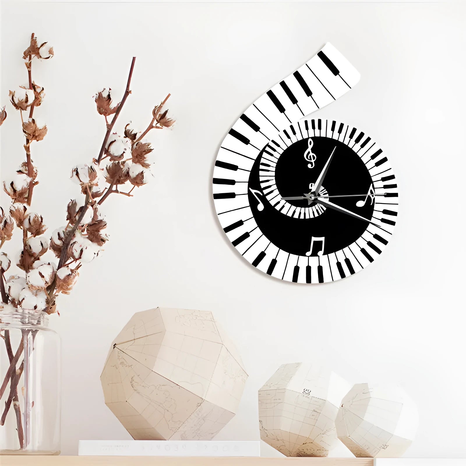 Black and white treble clef shaped wall clock with piano keyboard and musical note decoration