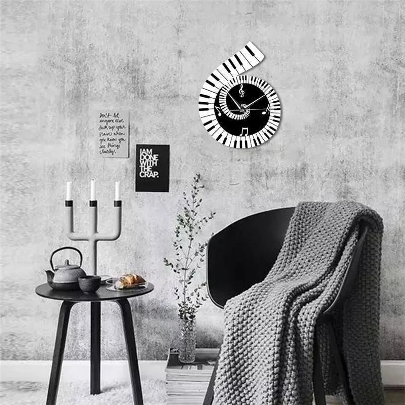 Black and white treble clef shaped wall clock with piano keyboard and musical note decoration
