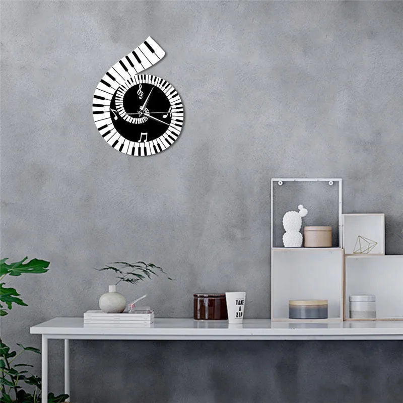Black and white treble clef shaped wall clock with piano keyboard and musical note decoration
