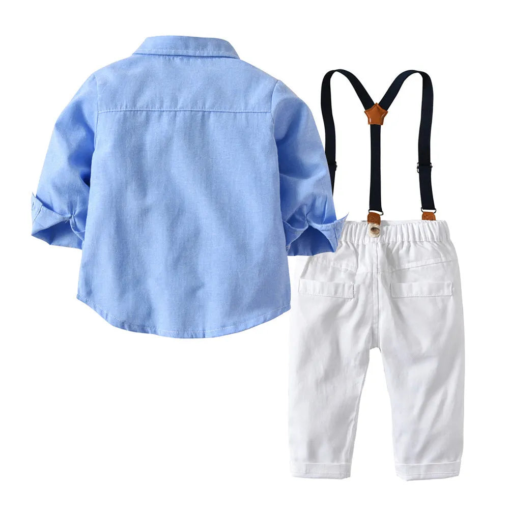 Blue boys' formal pantsuit with bib-style top, long sleeves, and a matching bow tie.