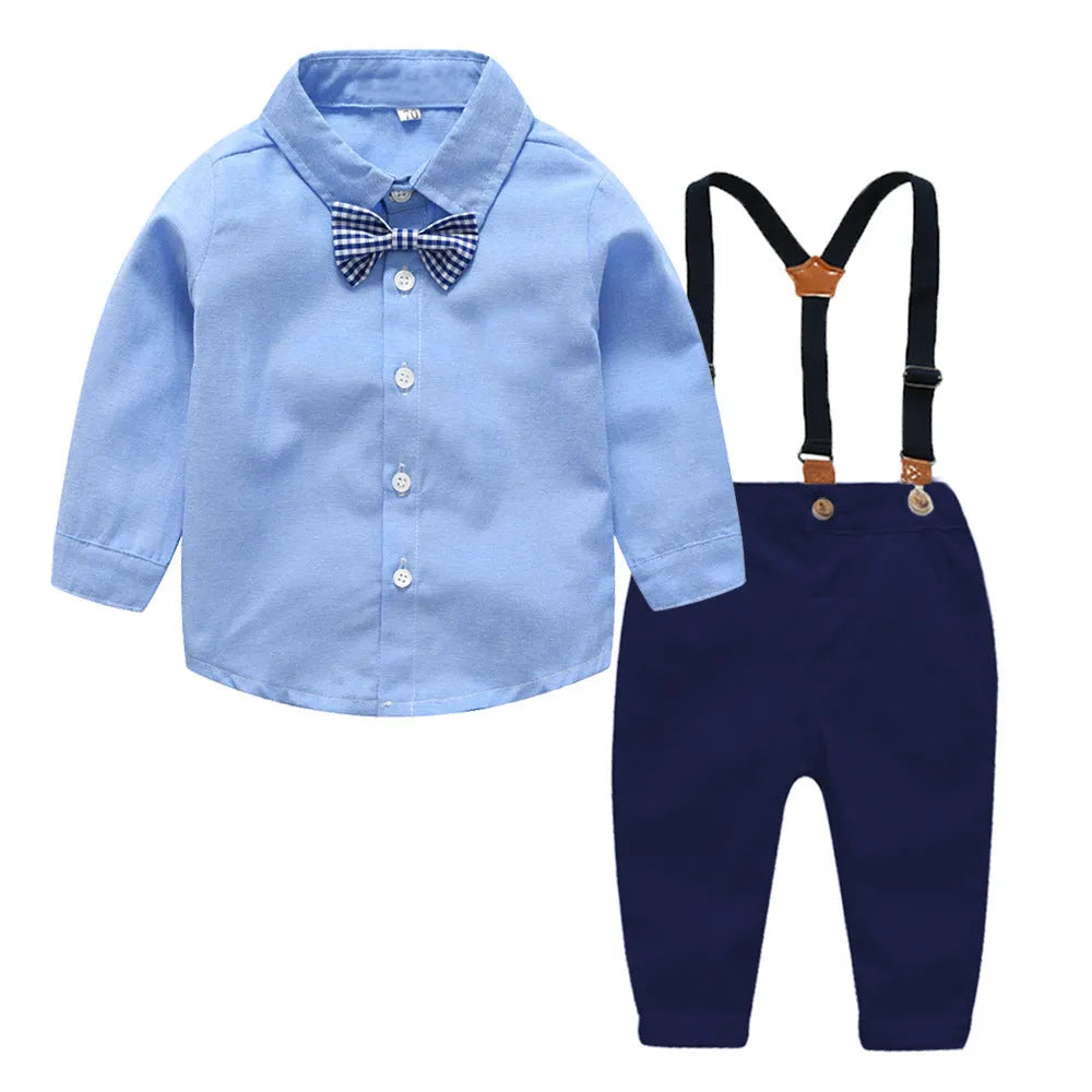 Blue boys' formal pantsuit with bib-style top, long sleeves, and a matching bow tie.