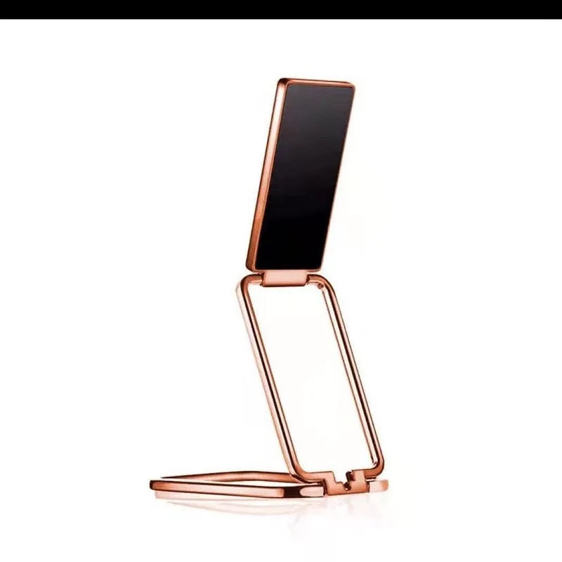 Gun black folding ring buckle phone holder attached to phone back, ring open for desktop stand