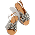 Women flat sandals in denim blue with low heel and slip-on design for summer beach wear.