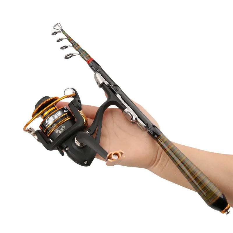 Telescopic carbon fibre rock fishing rod shrunk to 31cm portable size, shown beside a pocket for scale