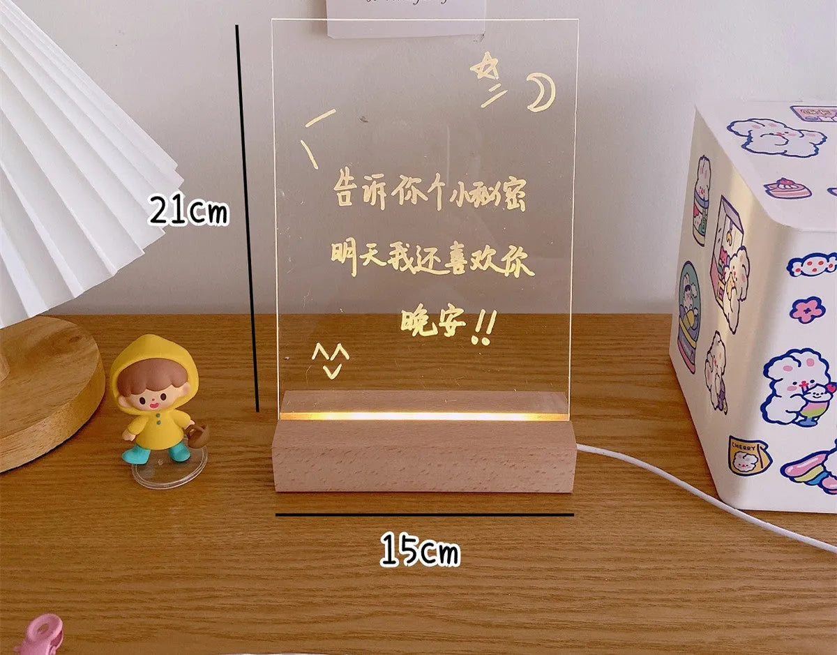 Bedside LED night light with message board surface and included lamp holder for bedroom use