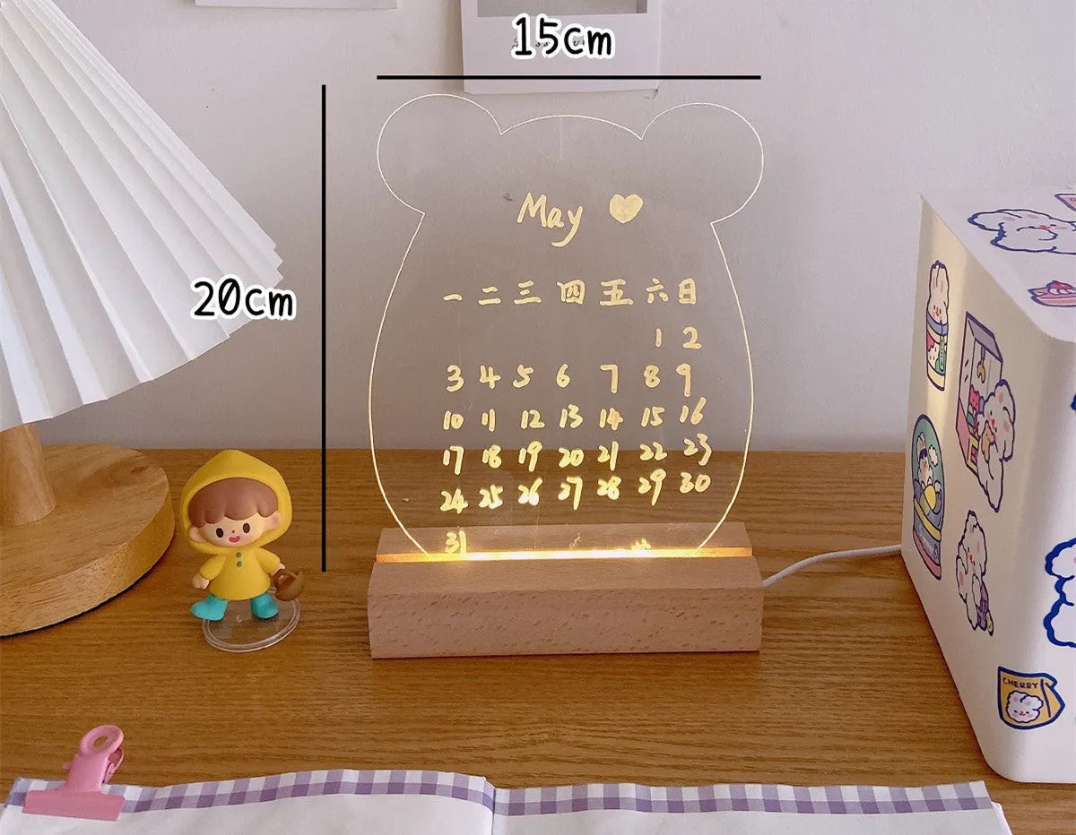 Bedside LED night light with message board surface and included lamp holder for bedroom use
