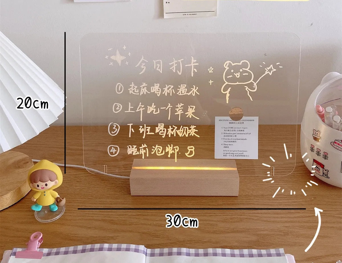 Bedside LED night light with message board surface and included lamp holder for bedroom use