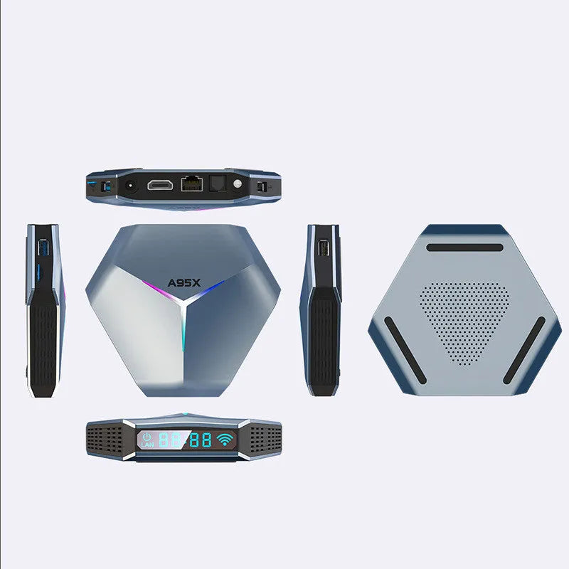 Android 8K TV set-top box with remote control, HD cable, and regional power adapter on a table.