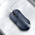 Blue wireless voice translation mouse with scroll wheel and voice control button on a desk.
