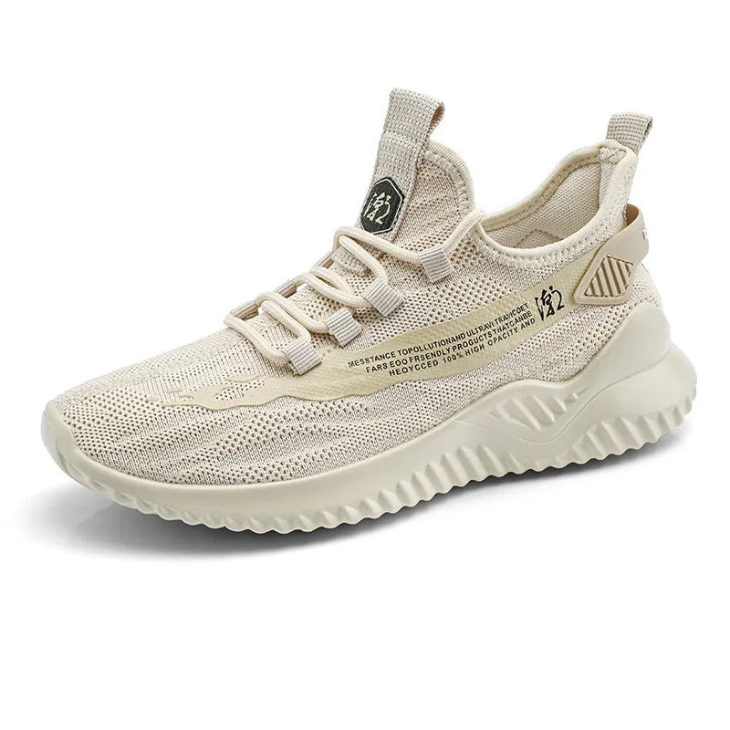 Men's white mesh sports shoes with rubber soles and round toe on neutral background