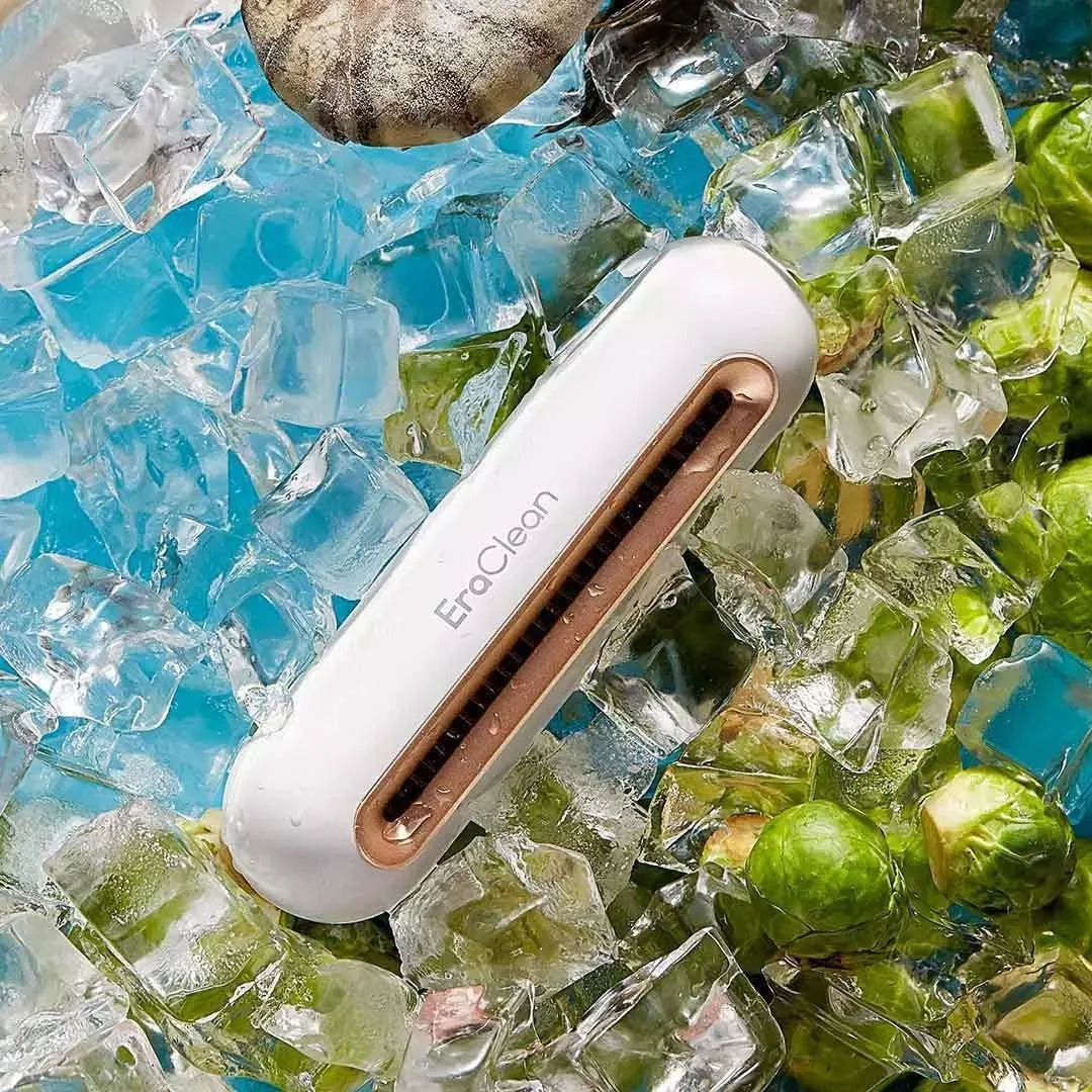 Rose gold USB-powered car air purifier and deodoriser with push-button control.