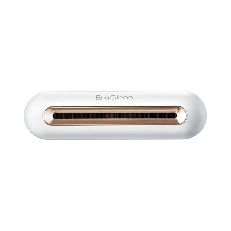 Rose gold USB-powered car air purifier and deodoriser with push-button control.