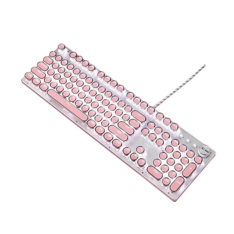 Queen Lipstick mechanical keyboard with green switches, white backlight, silver base, pink accents, and wired USB mouse on a desk.