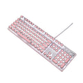 Queen Lipstick mechanical keyboard with green switches, white backlight, silver base, pink accents, and wired USB mouse on a desk.