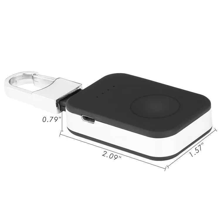Black Apple Watch wireless keychain power bank showing compact size and charging surface.